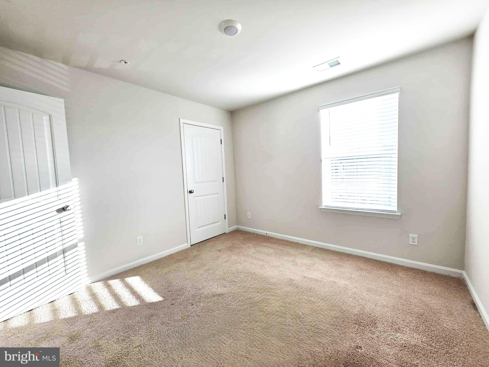374 Robbins Farm Road Cambridge, MD 21613 - Photo 39 of 48 an empty room with windows