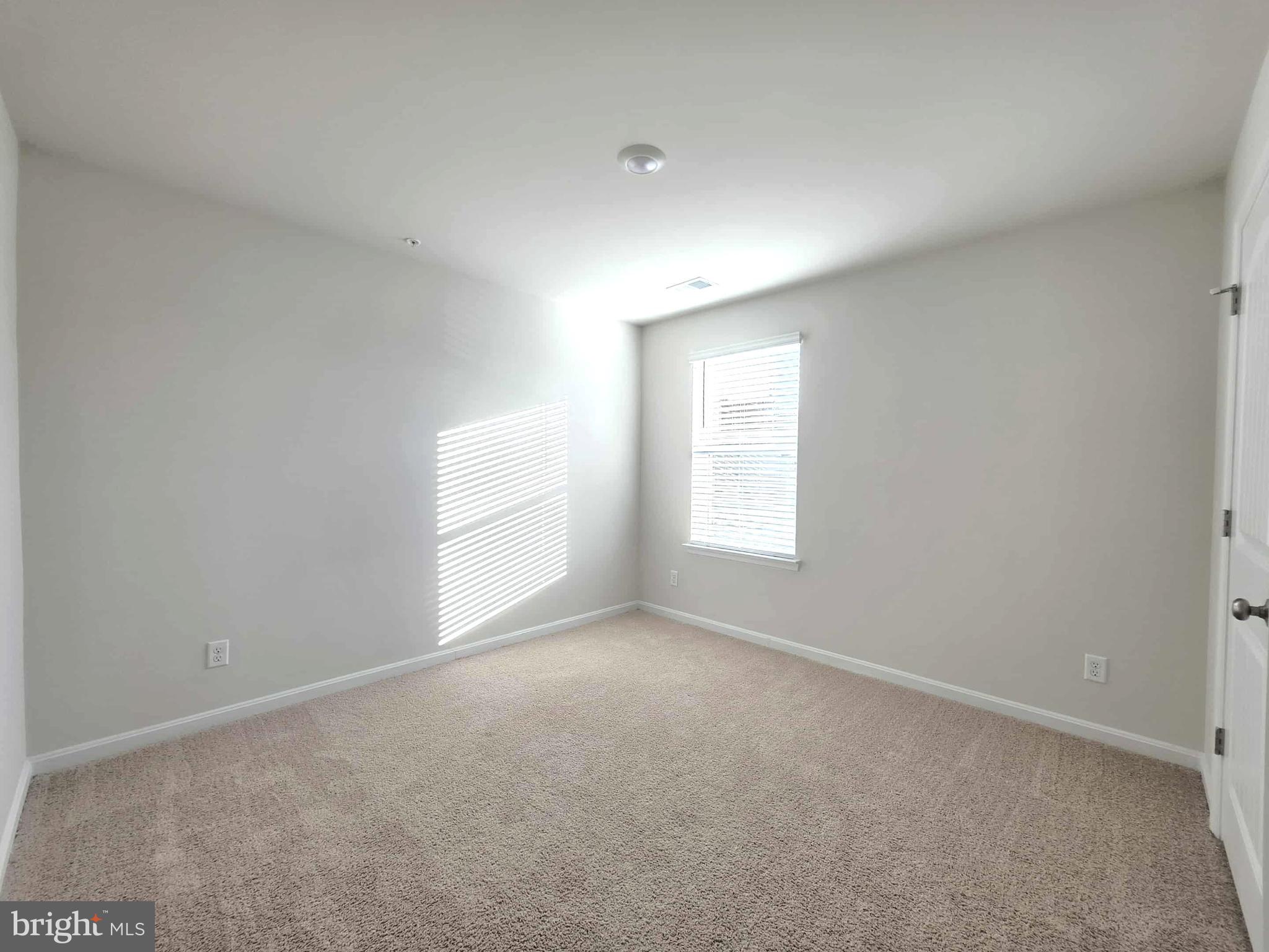 374 Robbins Farm Road Cambridge, MD 21613 - Photo 43 of 48 an empty room with windows and closet