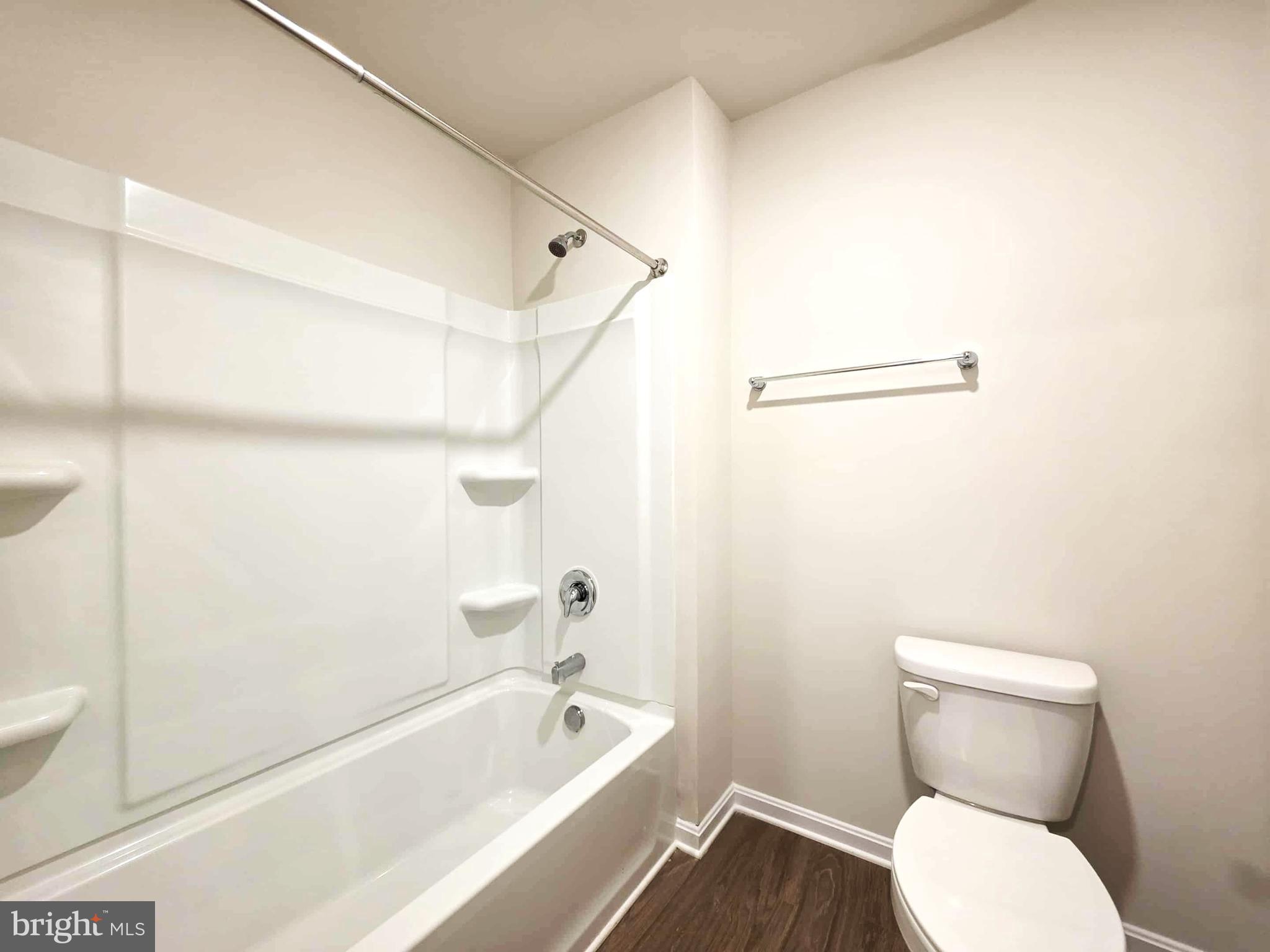 374 Robbins Farm Road Cambridge, MD 21613 - Photo 46 of 48 a bathroom with a toilet and a bathtub