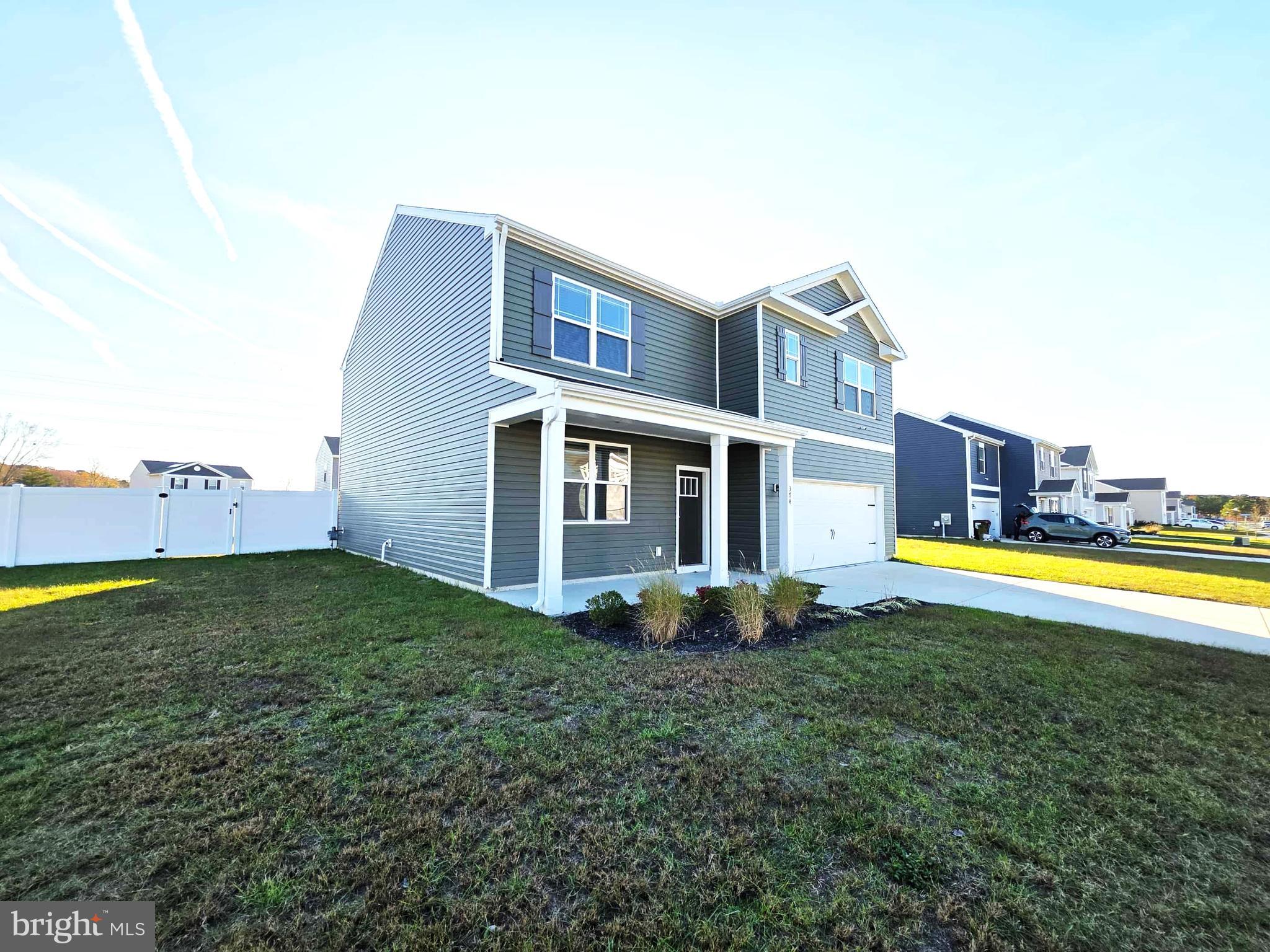 374 Robbins Farm Road Cambridge, MD 21613 - Photo 5 of 48 a view of a house with a swimming pool