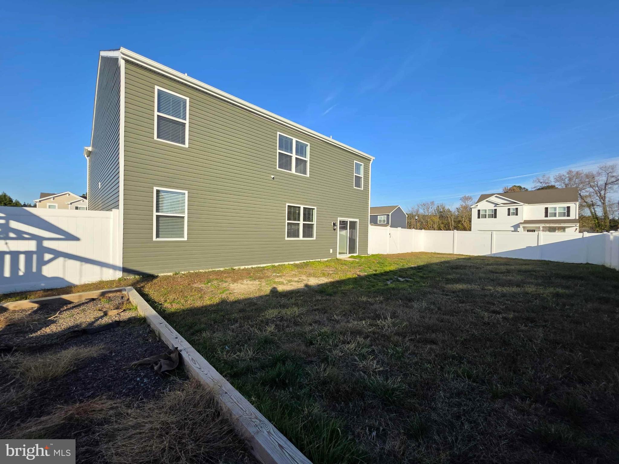 374 Robbins Farm Road Cambridge, MD 21613 - Photo 7 of 48 a view of an house with backyard space and balcony