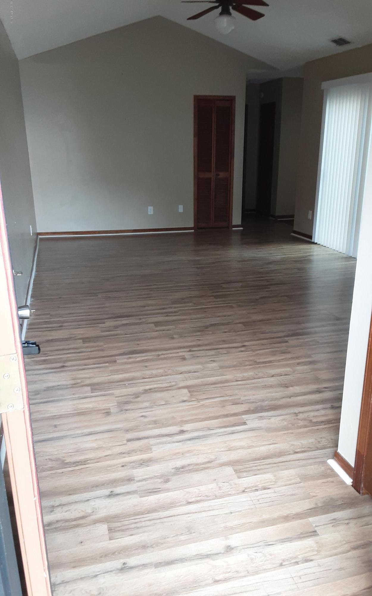 2100 Cornell Road Middleburg, FL 32068 - Photo 4 of 20 a view of an empty room and window