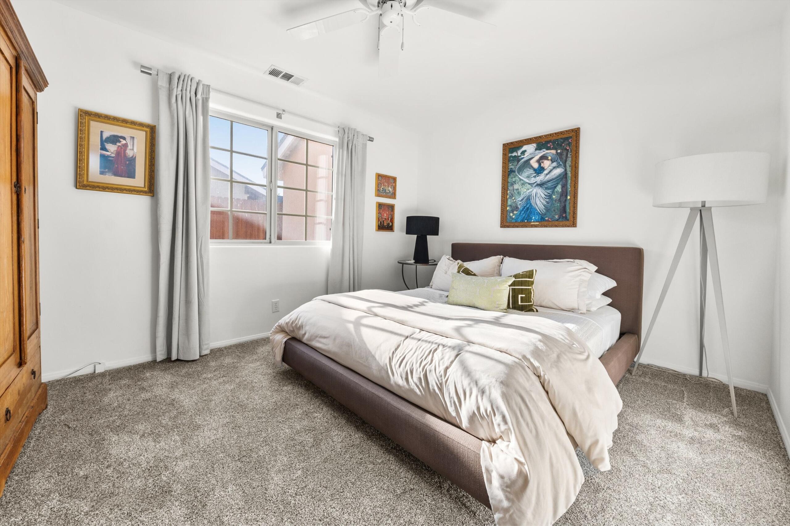 4565 Chapparral Drive Carpinteria, CA 93013 - Photo 14 of 23 a bedroom with bed and a window