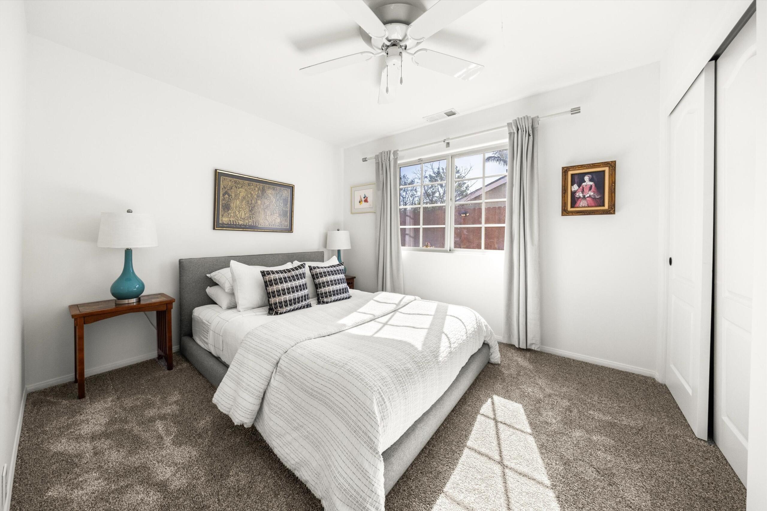 4565 Chapparral Drive Carpinteria, CA 93013 - Photo 16 of 23 a bedroom with bed and window