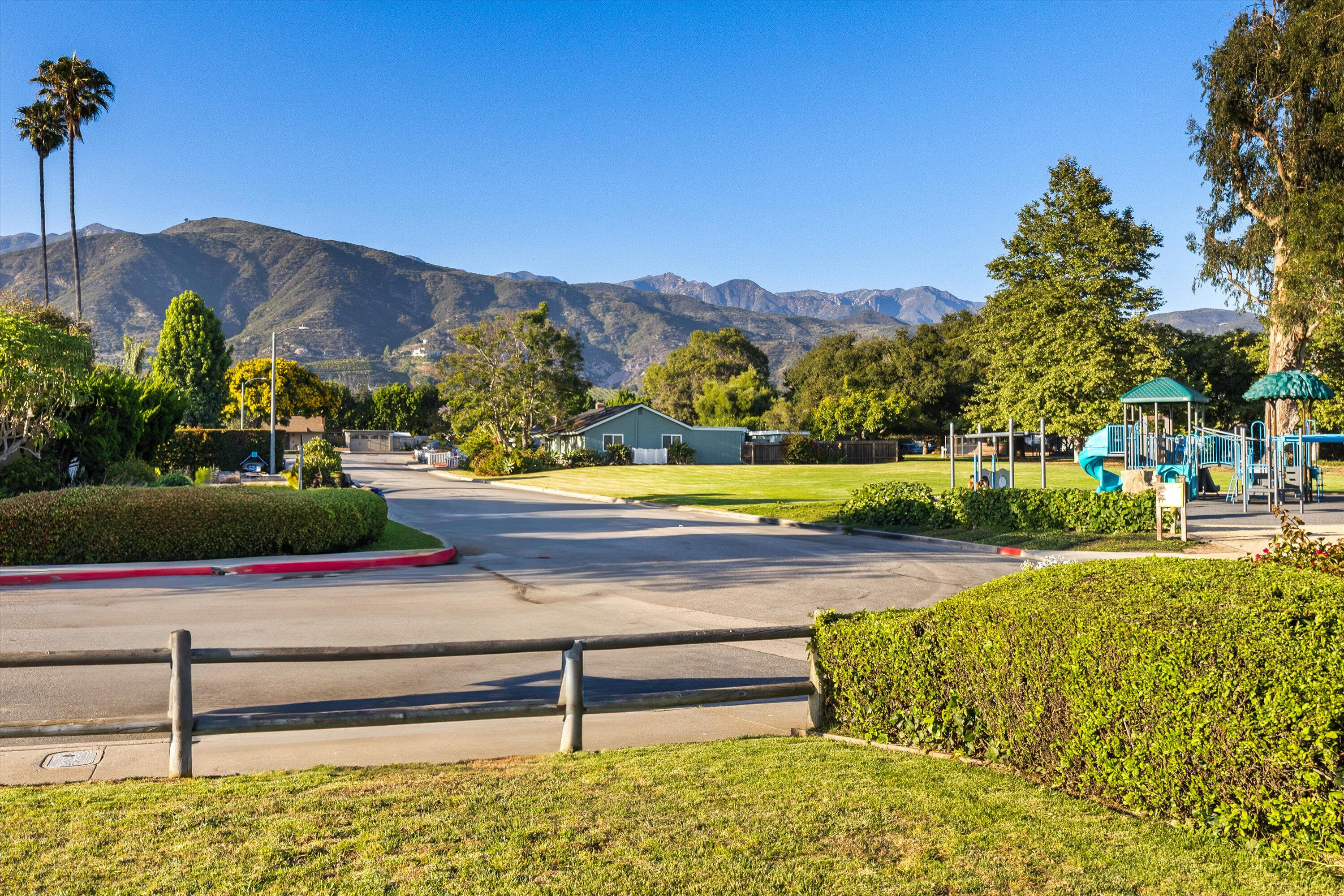 4565 Chapparral Drive Carpinteria, CA 93013 - Photo 3 of 23 a view of swimming pool with a yard and mountain view