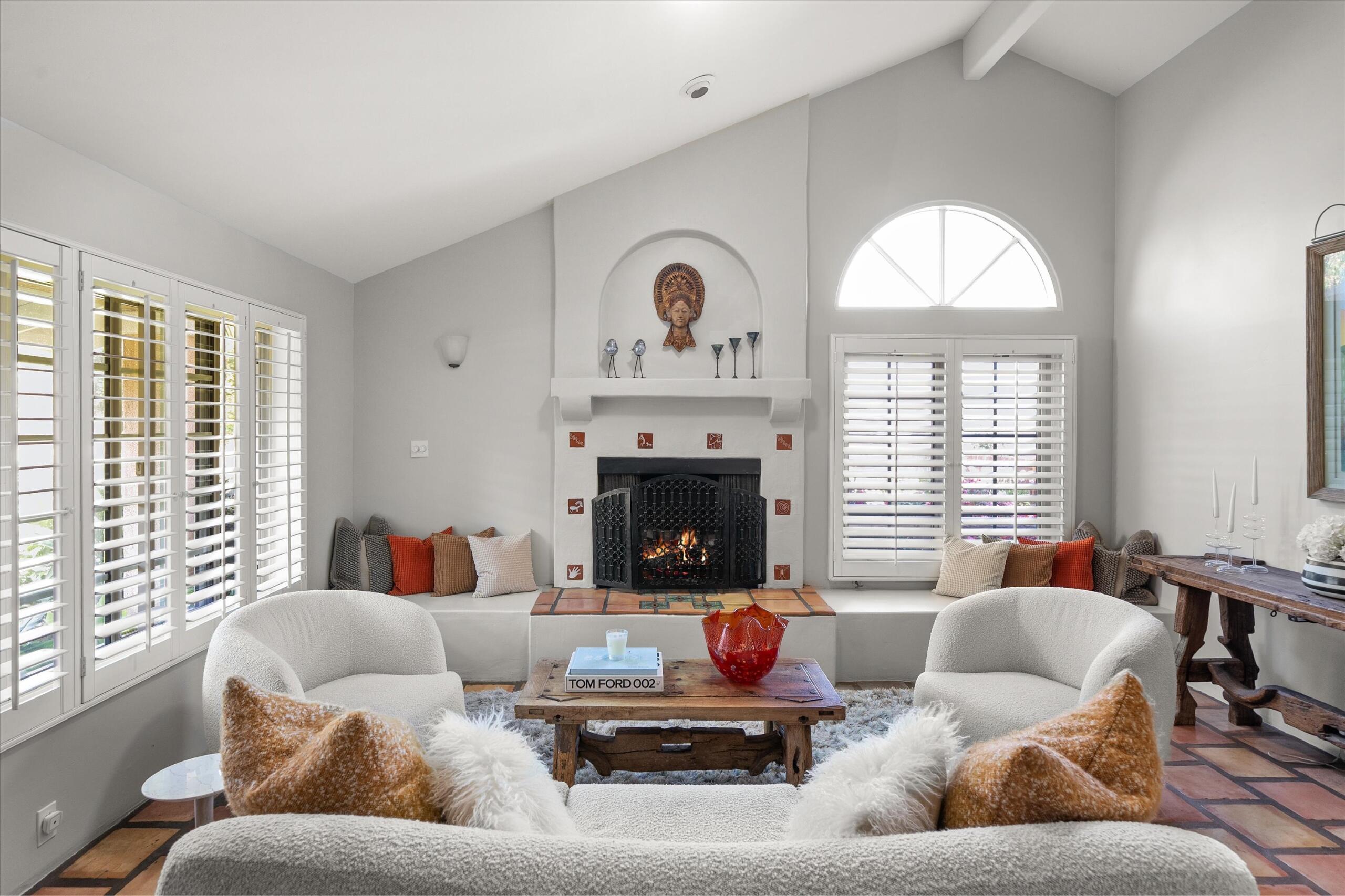 4565 Chapparral Drive Carpinteria, CA 93013 - Photo 6 of 23 a living room with furniture and a fireplace