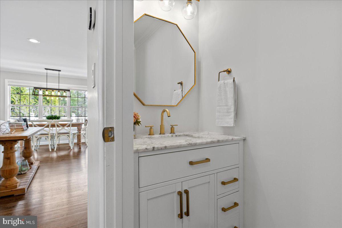 67 Randall Road Princeton, NJ 08540 - Photo 18 of 47 a bathroom with a sink a mirror and a window