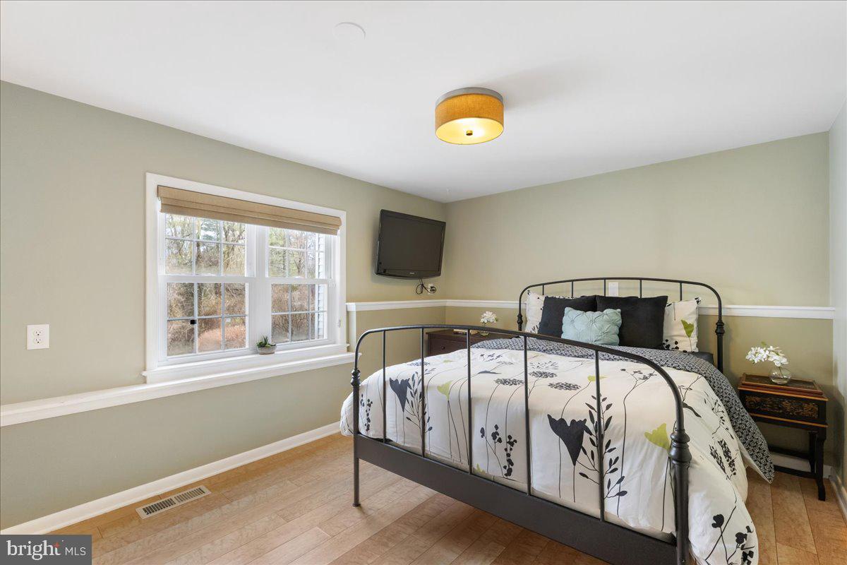 67 Randall Road Princeton, NJ 08540 - Photo 19 of 47 a bedroom with a bed and a window