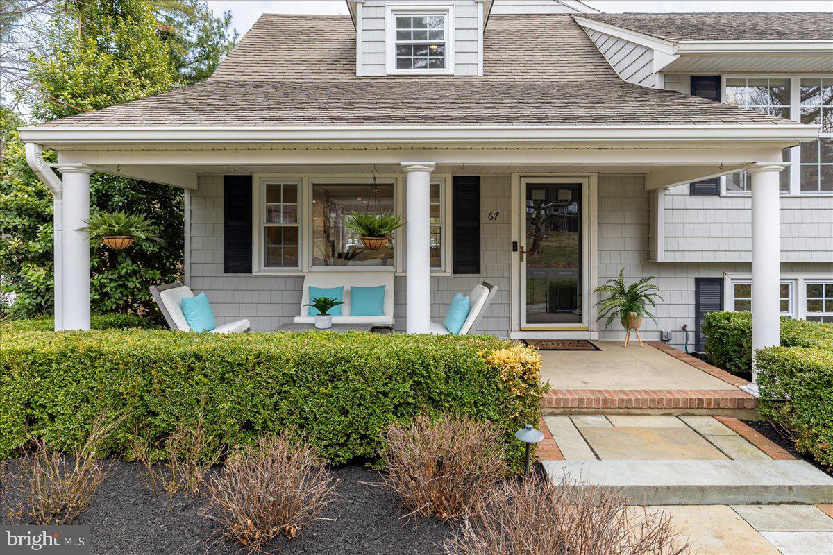 67 Randall Road Princeton, NJ 08540 - Photo 2 of 47 front view of a brick house with potted plants