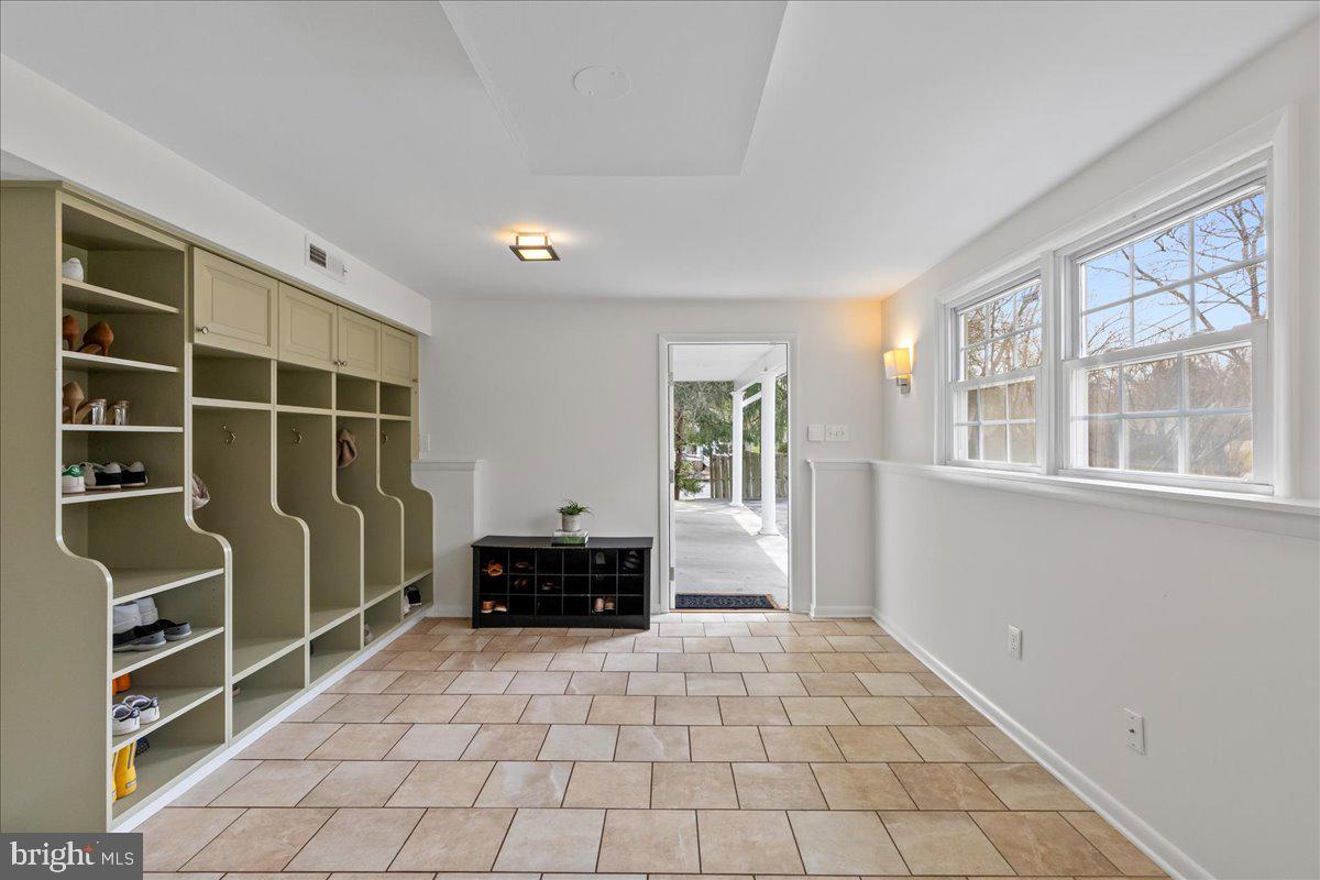 67 Randall Road Princeton, NJ 08540 - Photo 22 of 47 a view of walk in closet with clothes and shoes