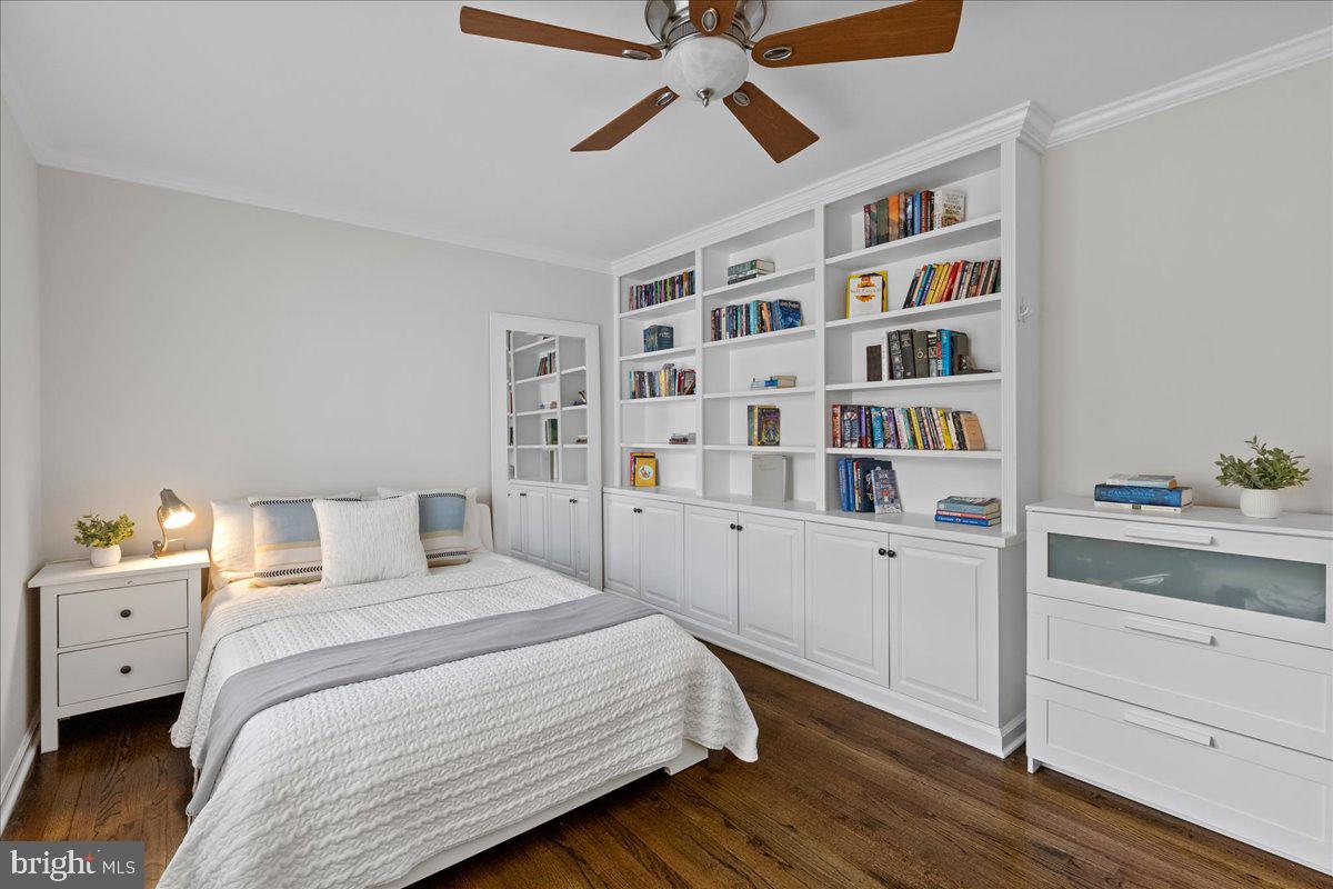 67 Randall Road Princeton, NJ 08540 - Photo 24 of 47 a bedroom with a bed and a book shelf