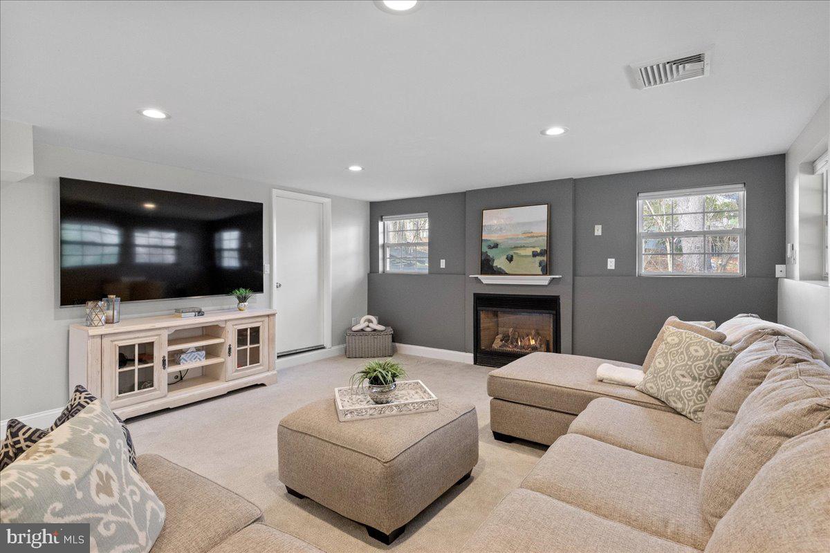 67 Randall Road Princeton, NJ 08540 - Photo 36 of 47 a living room with furniture and a flat screen tv