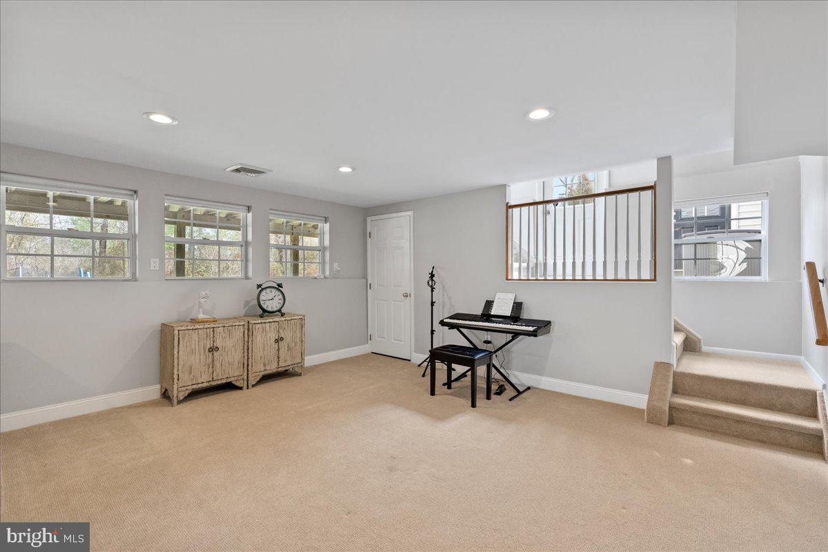 67 Randall Road Princeton, NJ 08540 - Photo 37 of 47 a living room with furniture and a window