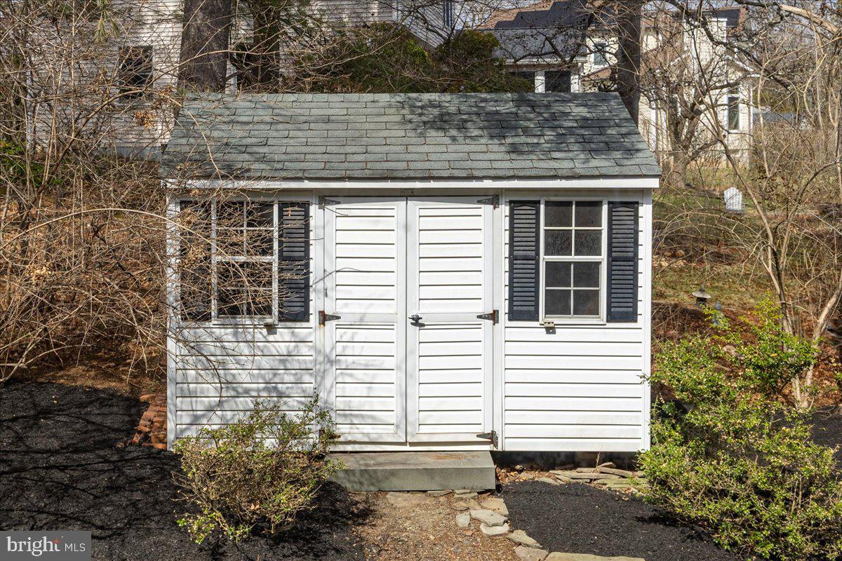 67 Randall Road Princeton, NJ 08540 - Photo 46 of 47 a view of a house with a yard and large tree
