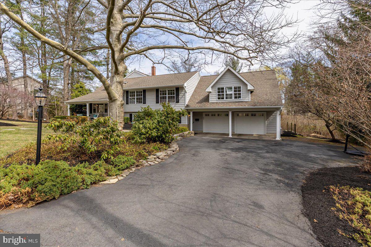 67 Randall Road Princeton, NJ 08540 - Photo 5 of 47 front view of a building with a garden