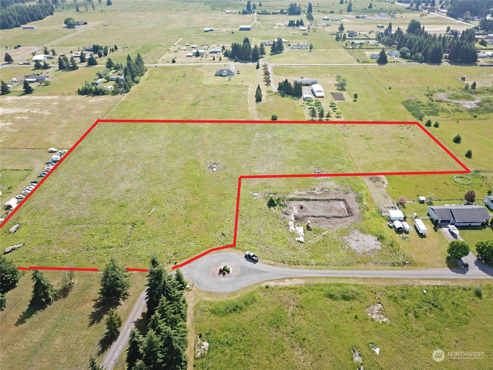 7501 182nd Trail Southwest Rochester, WA 98579 - Photo 3 of 15 an aerial view of a swimming pool