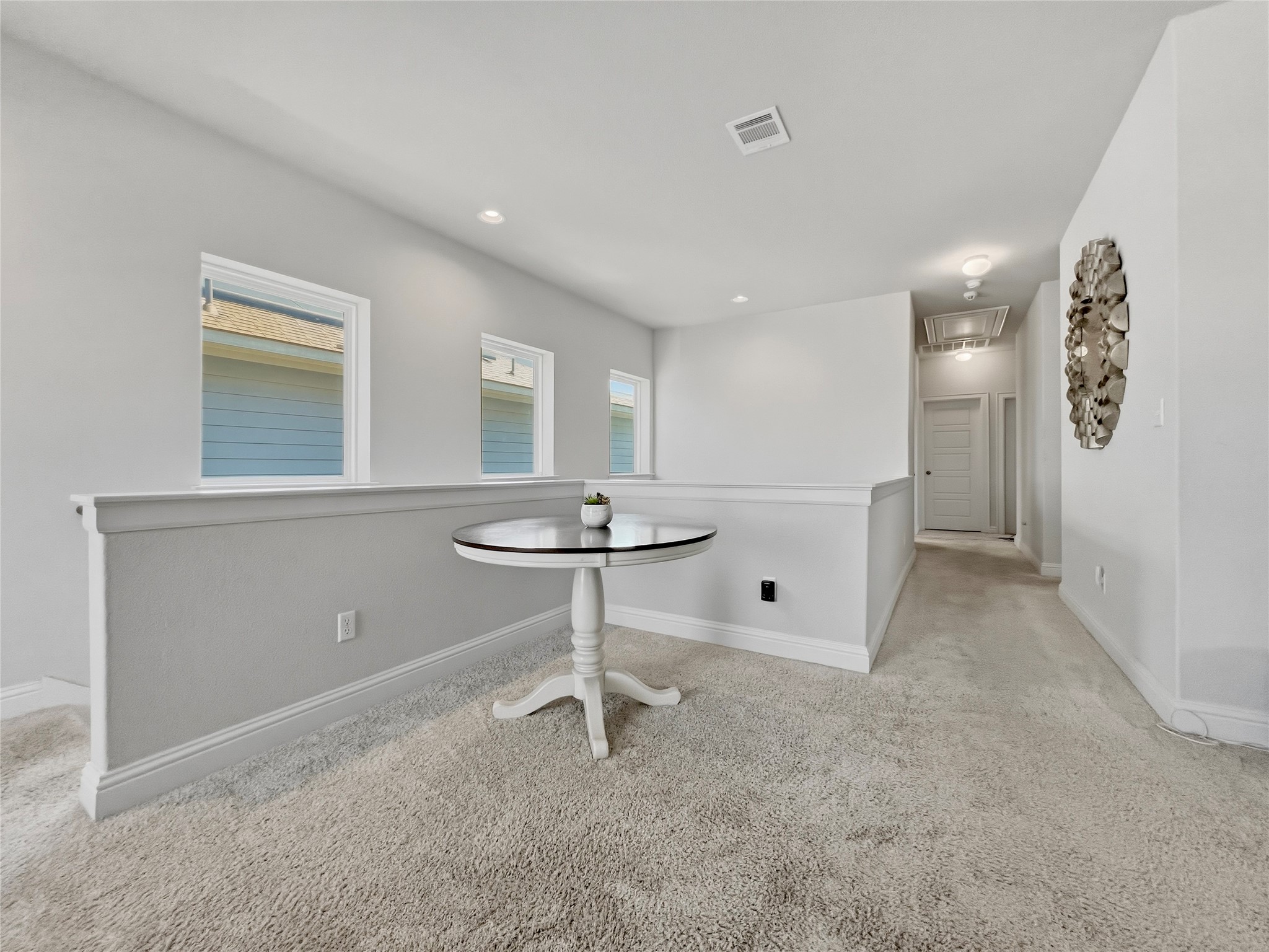 309 Gaida Loop Georgetown, TX 78628 - Photo 18 of 28 The landing area offers an adaptable space for a quiet retreat or study.