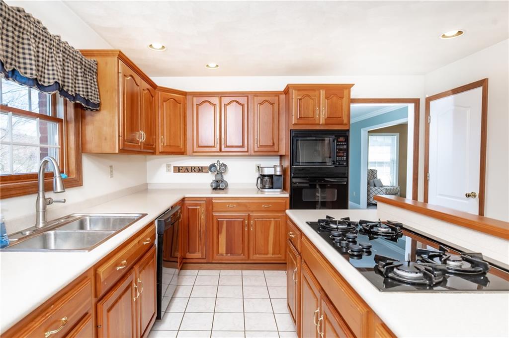 301 Forest Ridge Road Indiana, PA 15701 - Photo 20 of 41 a kitchen with stainless steel appliances granite countertop a stove and a sink