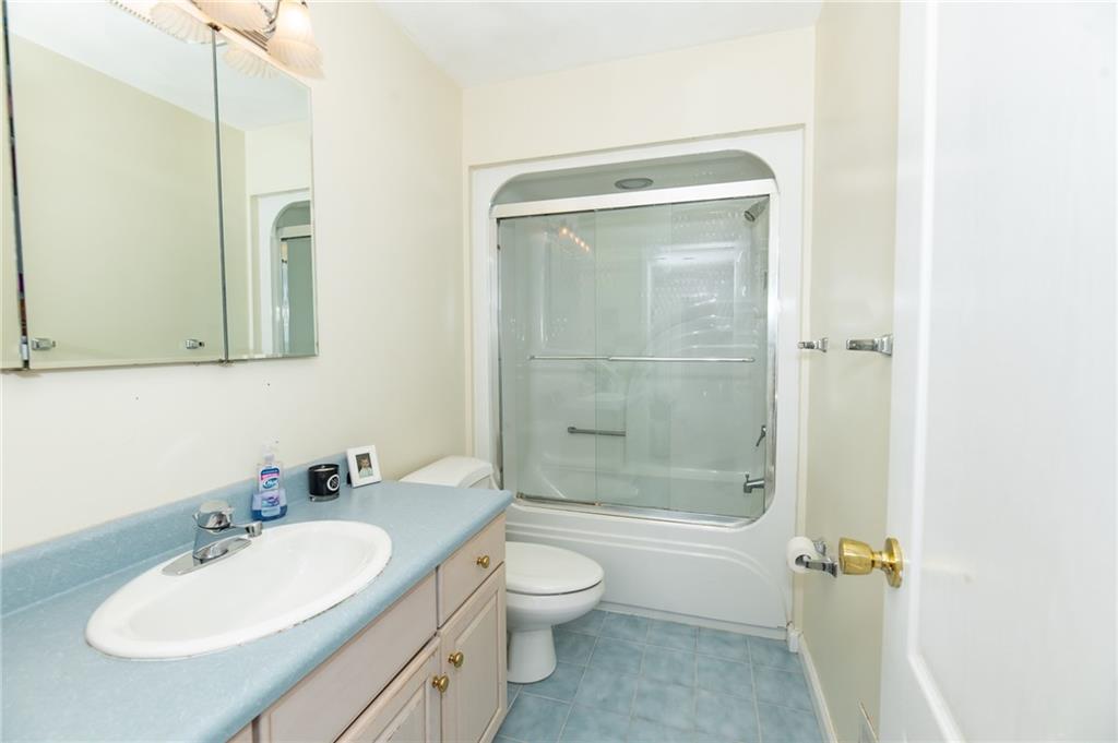301 Forest Ridge Road Indiana, PA 15701 - Photo 29 of 41 a bathroom with a sink a toilet and shower