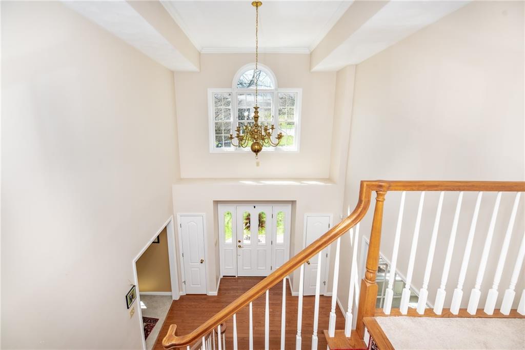 301 Forest Ridge Road Indiana, PA 15701 - Photo 3 of 41 a view of a hallway with furniture stairs and a chandelier