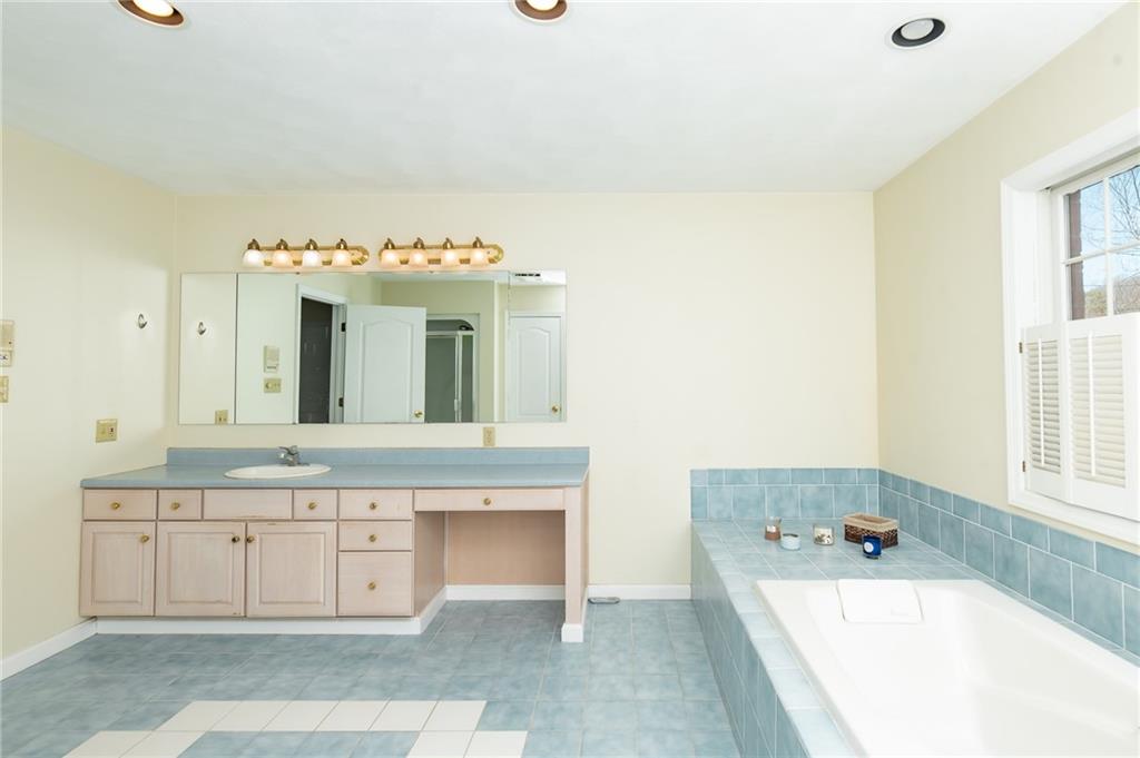 301 Forest Ridge Road Indiana, PA 15701 - Photo 34 of 41 a bathroom with a tub sink and mirror