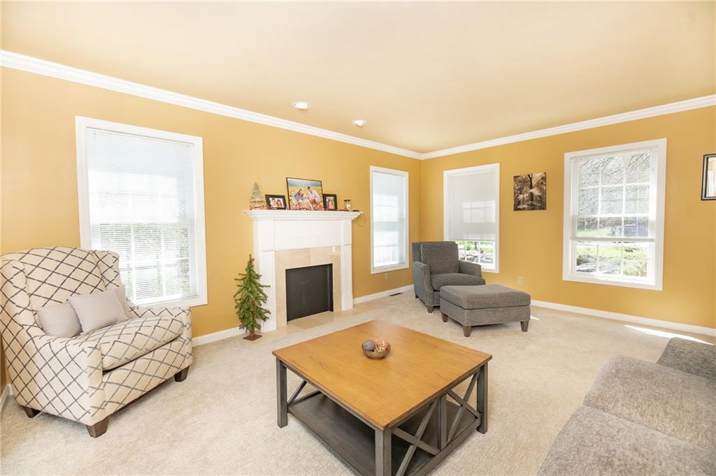 301 Forest Ridge Road Indiana, PA 15701 - Photo 6 of 41 a living room with furniture and a fireplace