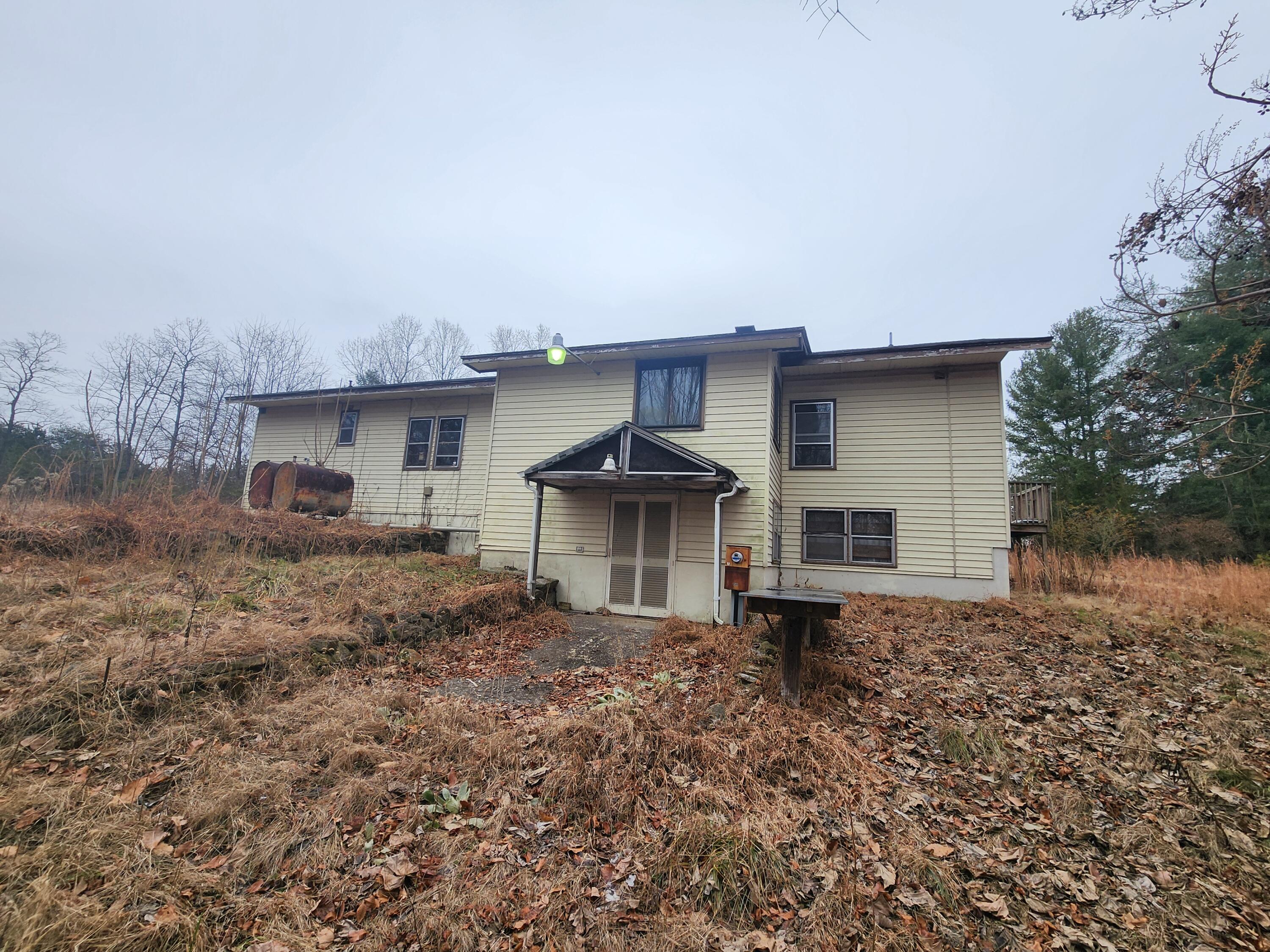 1617 Navigation Point Goodview, VA 24095 - Photo 3 of 12 a front view of a house with a yard