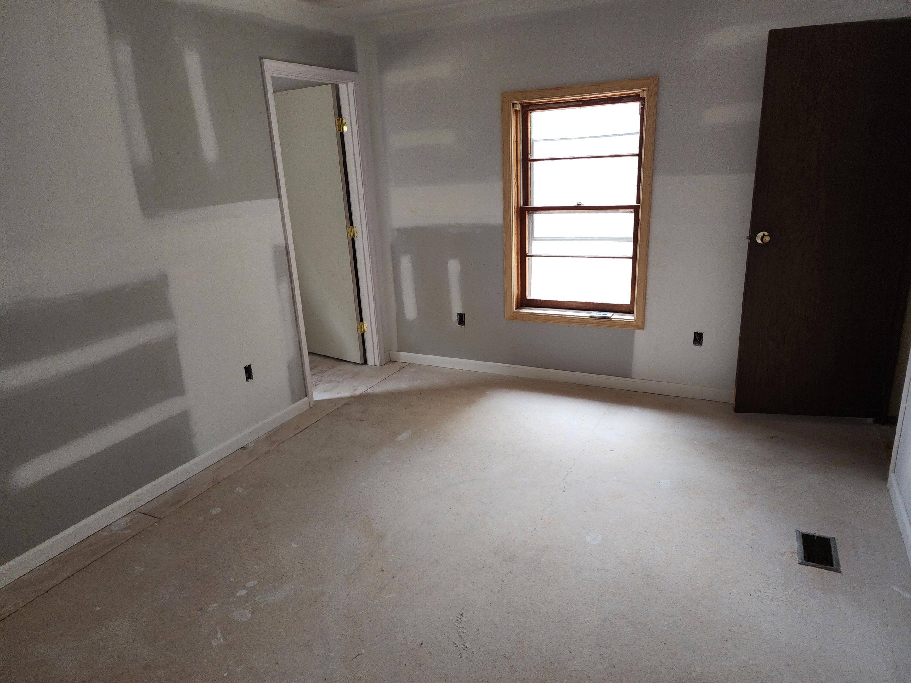 1617 Navigation Point Goodview, VA 24095 - Photo 8 of 12 a view of empty room with window