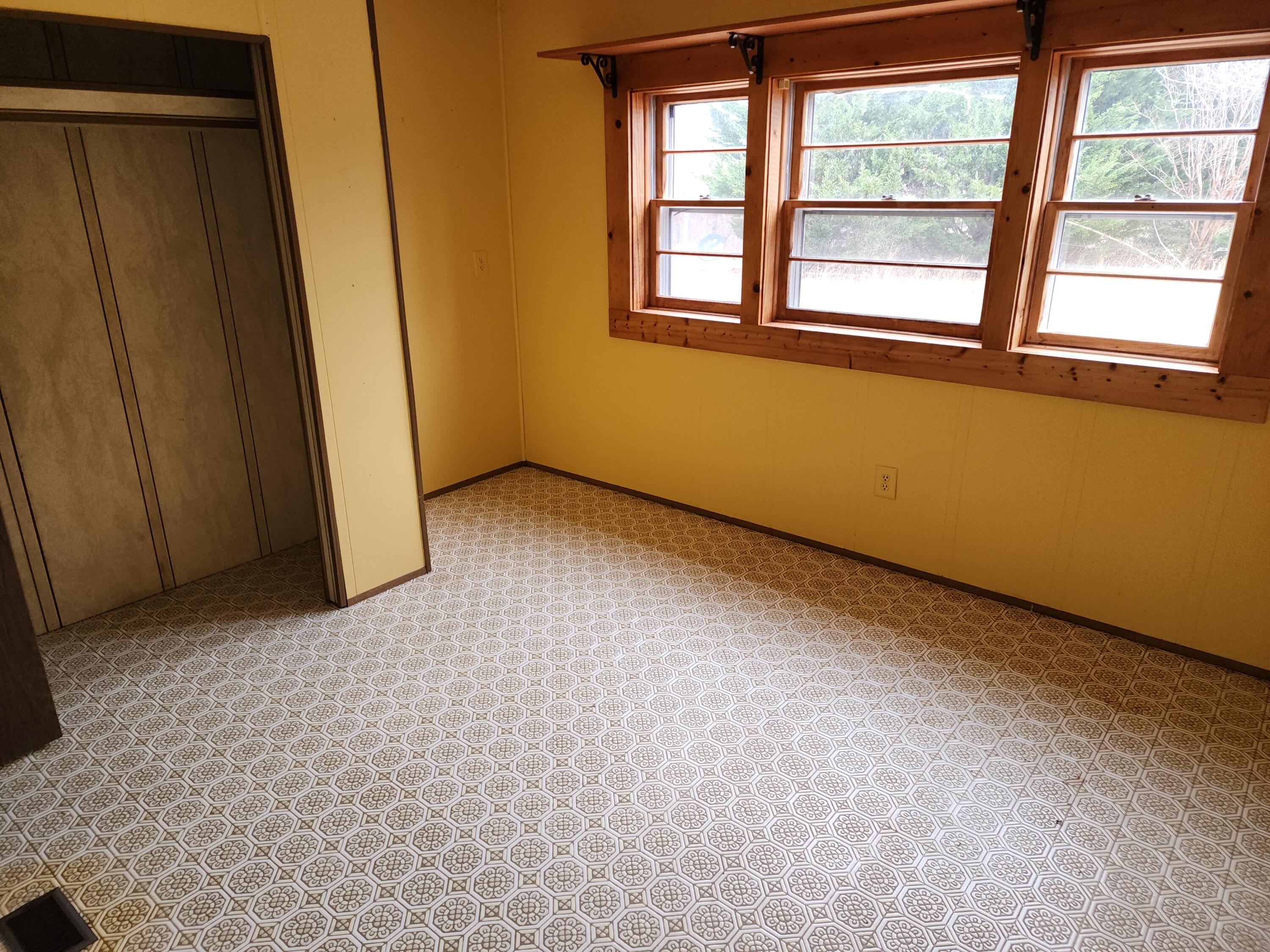 1617 Navigation Point Goodview, VA 24095 - Photo 10 of 12 an empty room with windows