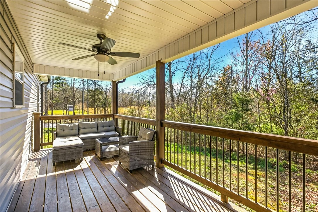 745 Dave Nix Road Seneca, SC 29678 - Photo 3 of 32 This inviting porch offers tranquil views, perfect for peaceful mornings or relaxing evenings.