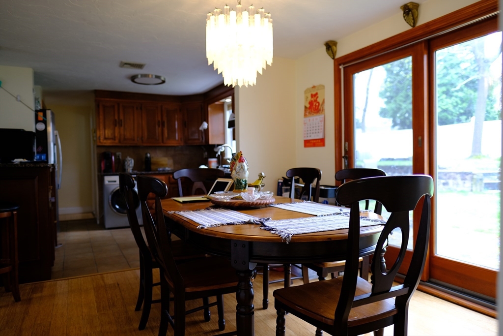 9 Stanley Street Natick, MA 01760 - Photo 13 of 42 a view of a dining room with furniture and a window
