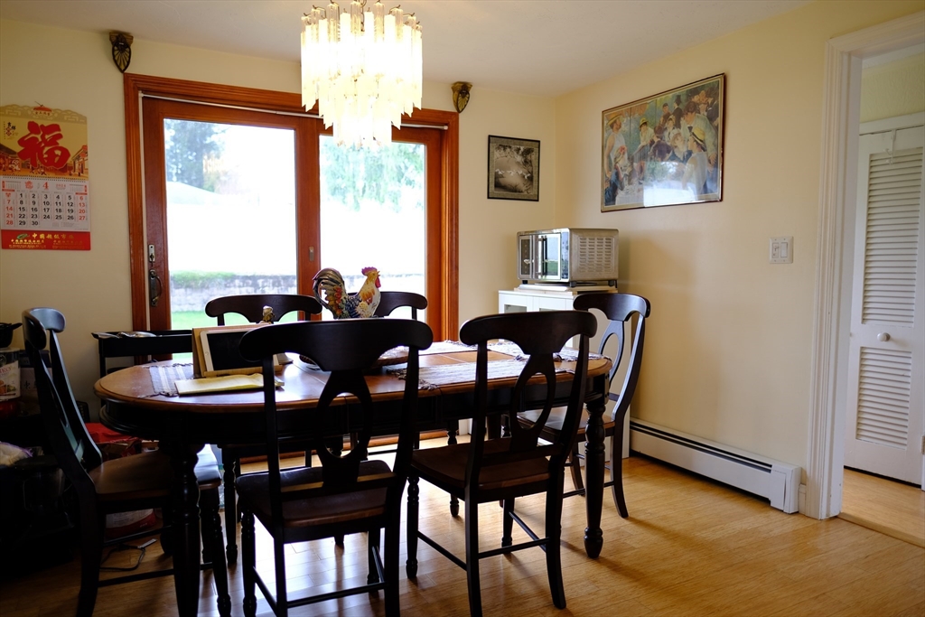 9 Stanley Street Natick, MA 01760 - Photo 14 of 42 a view of a dining room with furniture and window