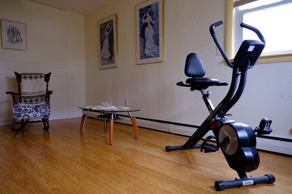 9 Stanley Street Natick, MA 01760 - Photo 20 of 42 a view of a workspace with furniture and a mirror
