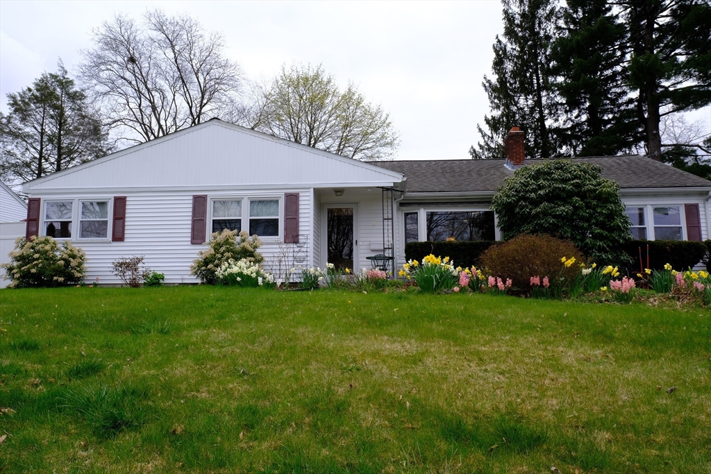 9 Stanley Street Natick, MA 01760 - Photo 2 of 42 a front view of a house with garden
