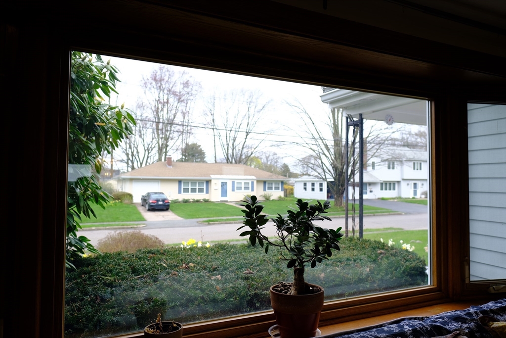 9 Stanley Street Natick, MA 01760 - Photo 23 of 42 a view of a house with a backyard