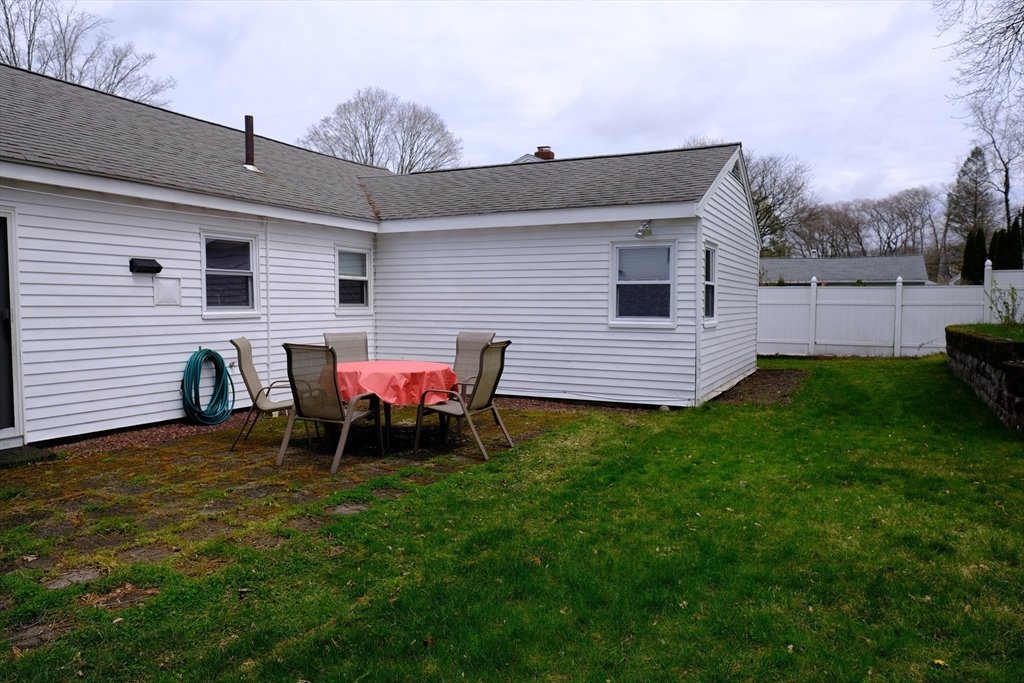 9 Stanley Street Natick, MA 01760 - Photo 8 of 42 a view of a house with a backyard
