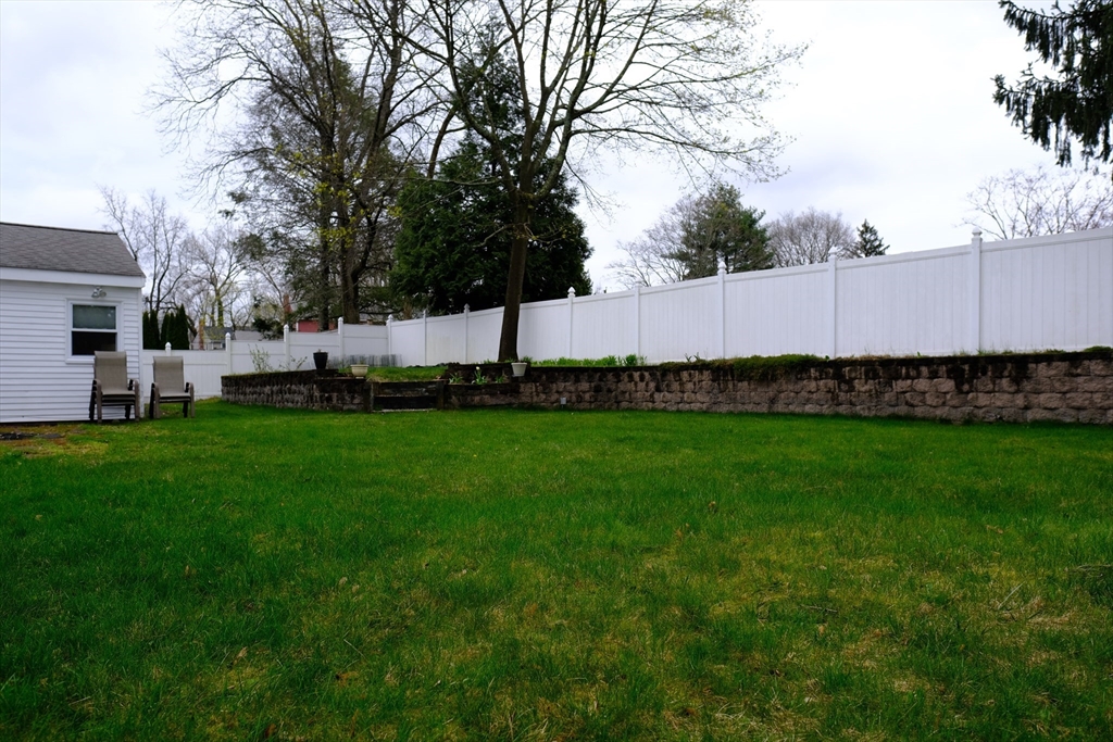 9 Stanley Street Natick, MA 01760 - Photo 10 of 42 a yard with wooden fence