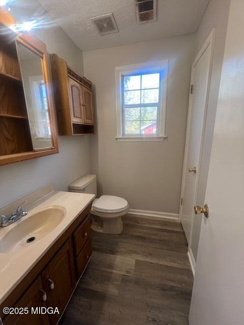 3935 Travis Boulevard Macon, GA 31206 - Photo 11 of 15 a bathroom with a sink a toilet and mirror