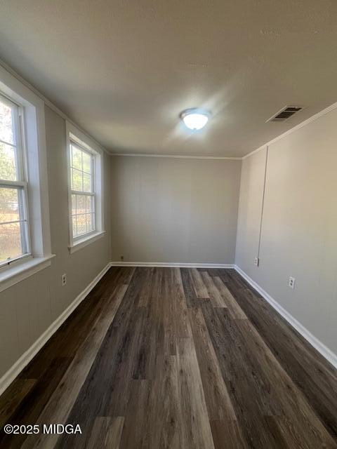 3935 Travis Boulevard Macon, GA 31206 - Photo 6 of 15 an empty room with wooden floor and windows