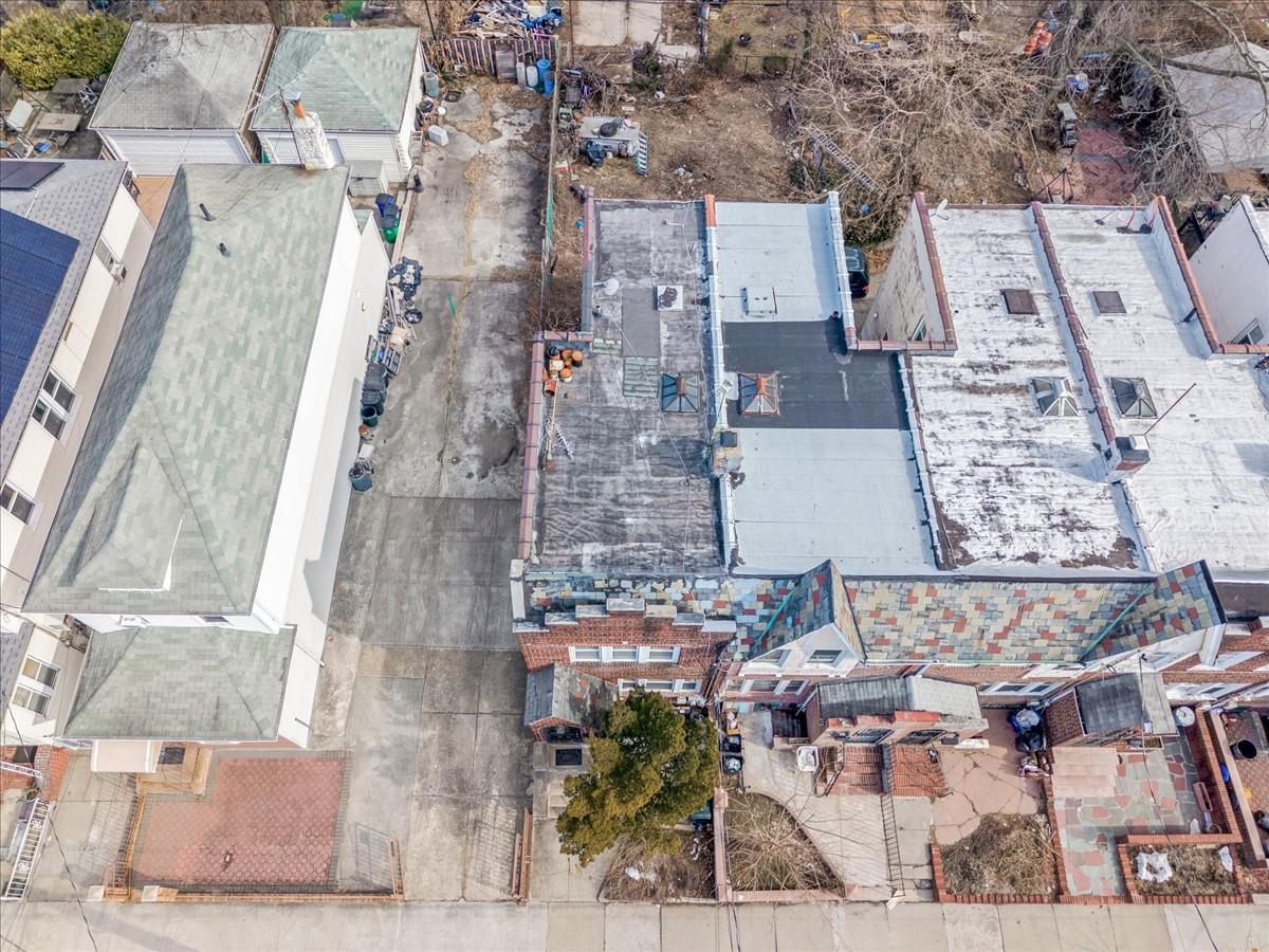 1775 Troy Avenue Brooklyn, NY 11234 - Photo 11 of 17 an aerial view of a house with a yard