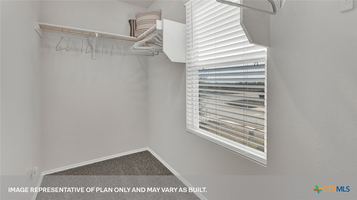 125 Kendall Lane Lockhart, TX 78644 - Photo 21 of 30 a view of a small space with racks on the wall