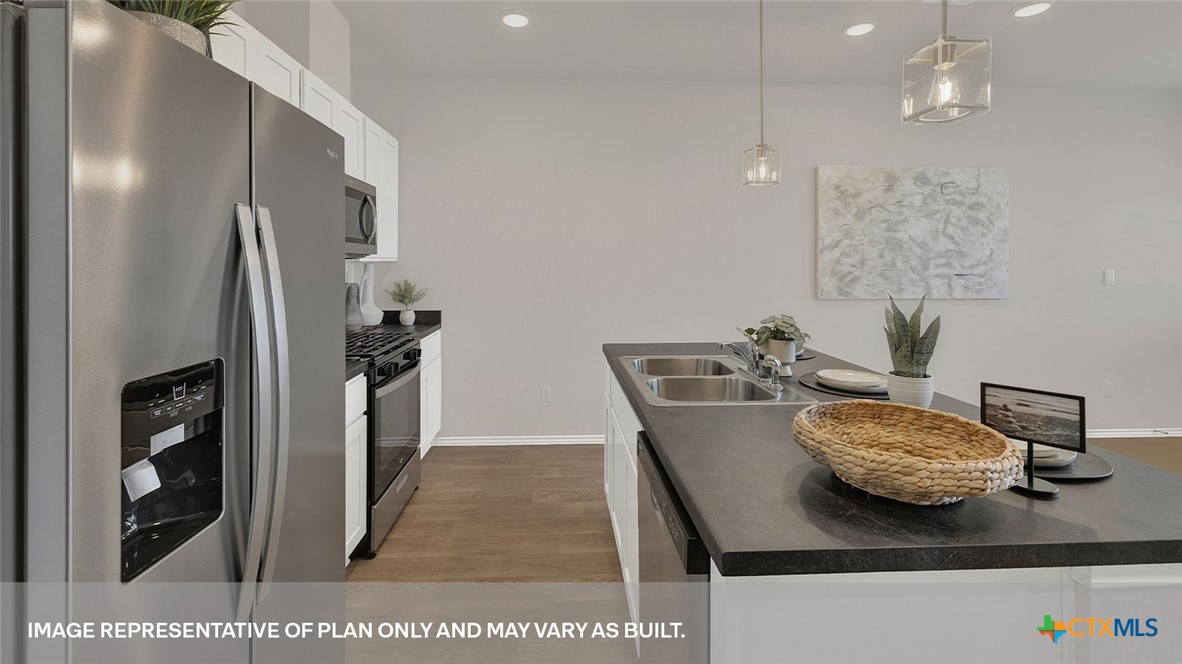 125 Kendall Lane Lockhart, TX 78644 - Photo 7 of 30 a view of a dining room with furniture