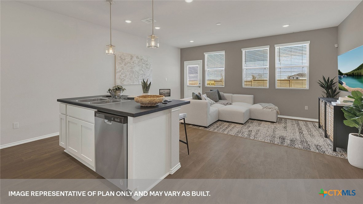 125 Kendall Lane Lockhart, TX 78644 - Photo 9 of 30 a view of living room with furniture and a flat screen tv