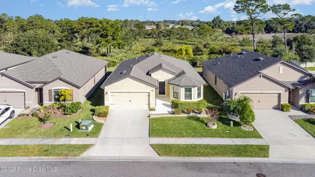 front view of house with a yard
