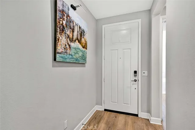 a bedroom with a bed and a desk