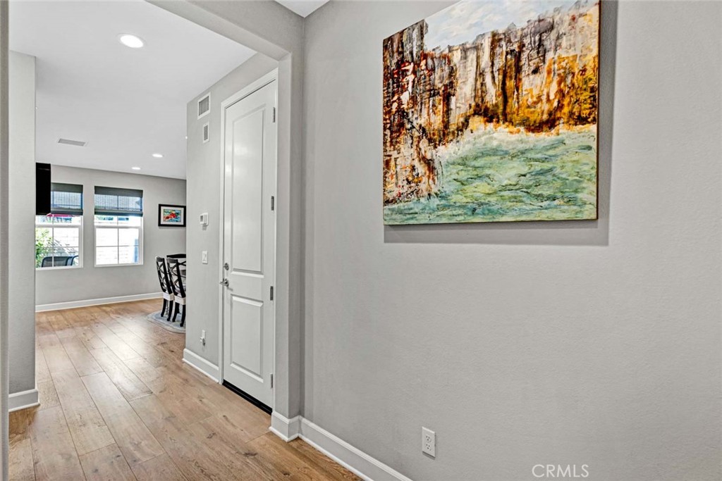 1270 Providence Loop Placentia, CA 92870 - Photo 19 of 59 Hallway leading to garage and kitchen/great room area.