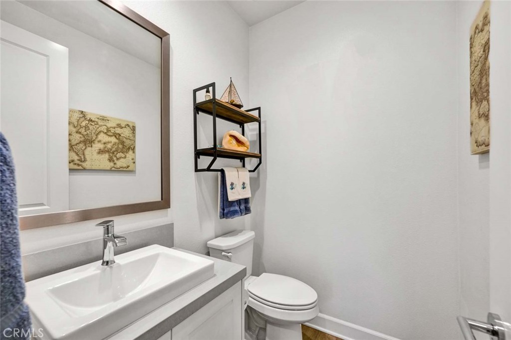1270 Providence Loop Placentia, CA 92870 - Photo 20 of 59 a bathroom with a sink mirror vanity and toilet