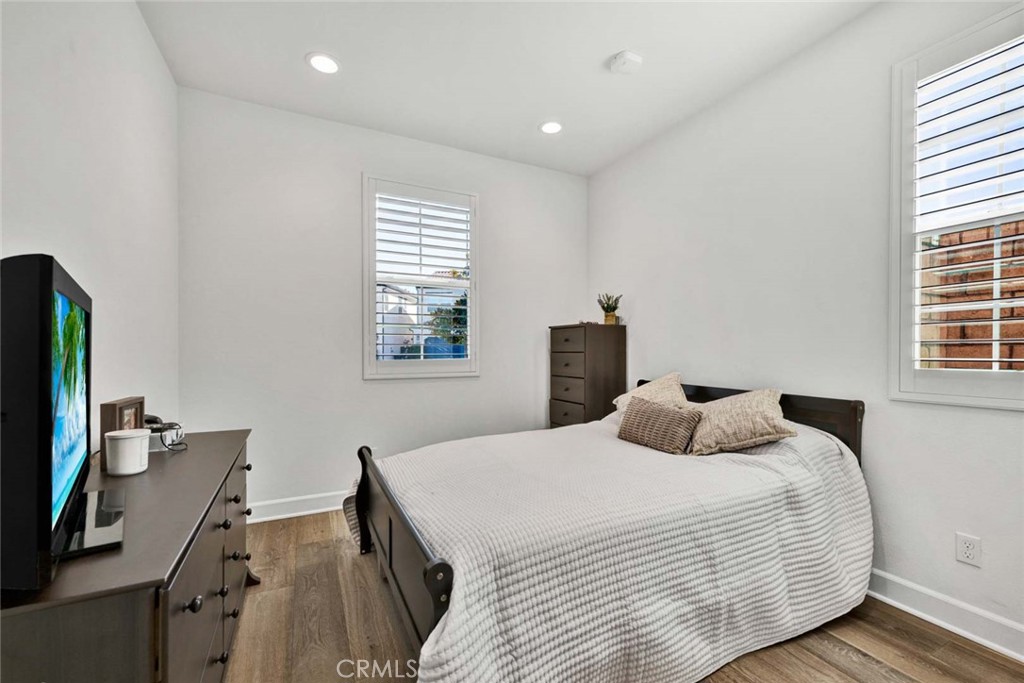 1270 Providence Loop Placentia, CA 92870 - Photo 21 of 59 a bedroom with a bed and a desk