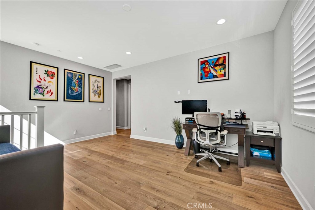 1270 Providence Loop Placentia, CA 92870 - Photo 27 of 59 a workspace with furniture window and wooden floor
