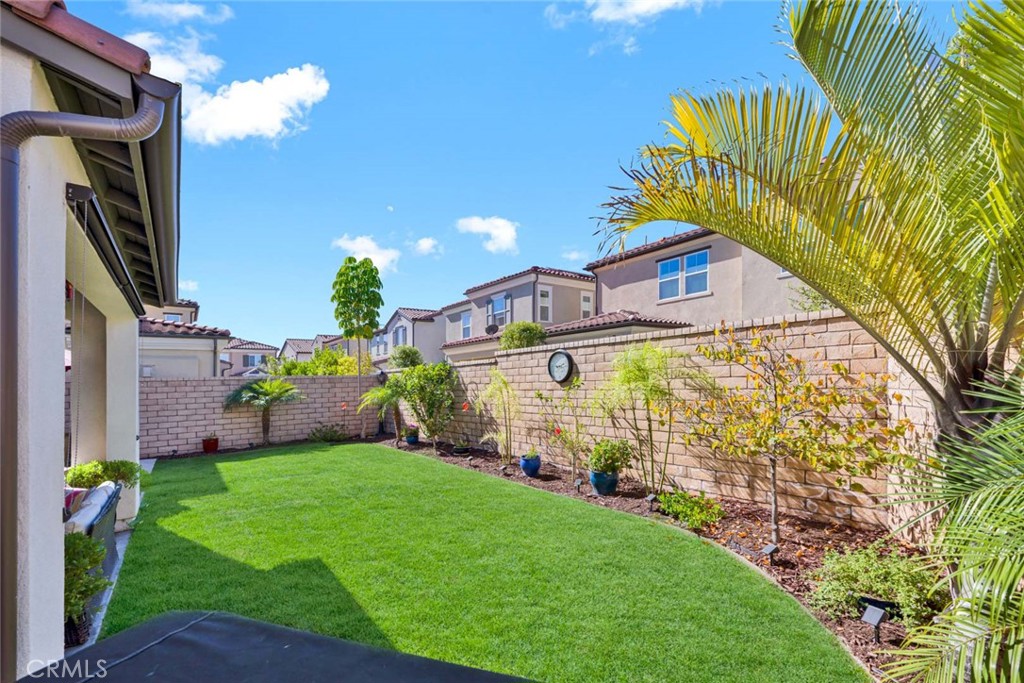 1270 Providence Loop Placentia, CA 92870 - Photo 2 of 59 a view of a house with a big yard and potted plants